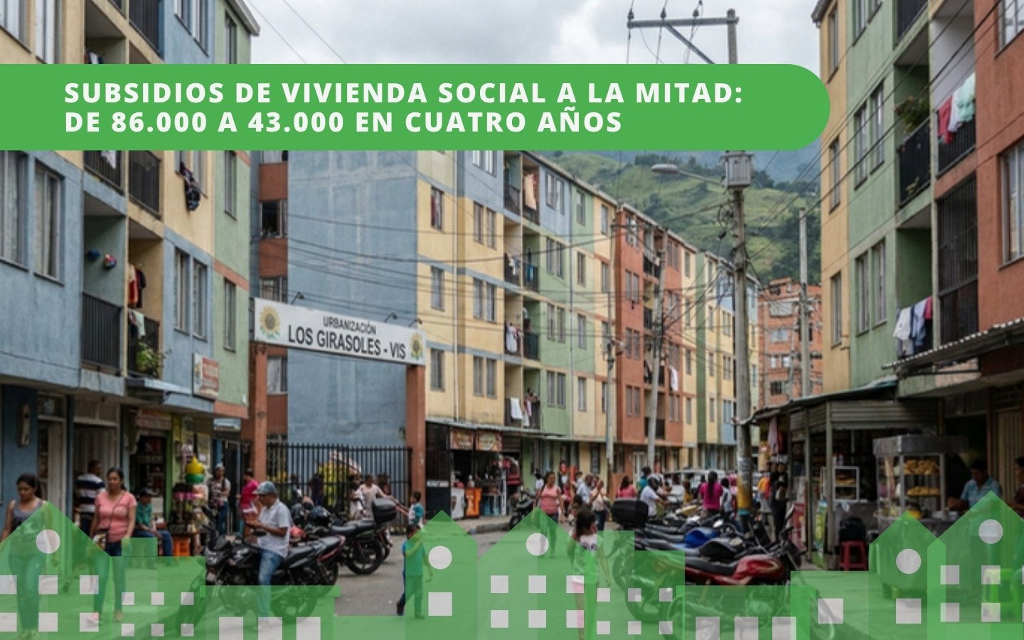 Urbanización de vivienda de interés social VIS en Colombia con edificios coloridos y residentes en la calle — subsidios 2025