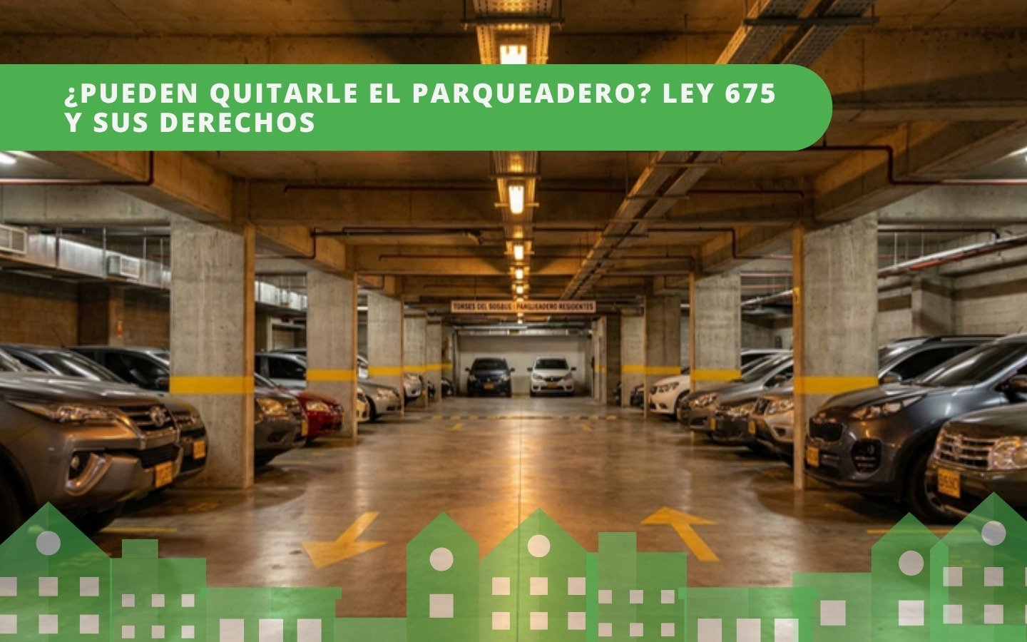Parqueadero subterráneo de conjunto residencial en Colombia con autos estacionados — derechos según Ley 675 de 2001
